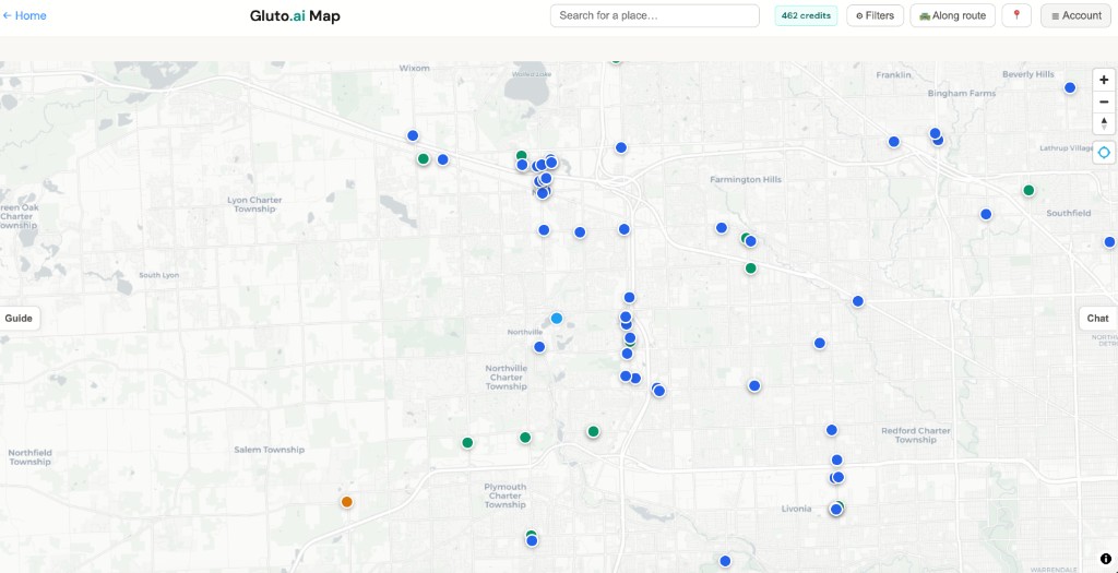 Map zoom near Novi Michigan with blue green and orange pins in Lyon Township, Northville, Farmington Hills corridor